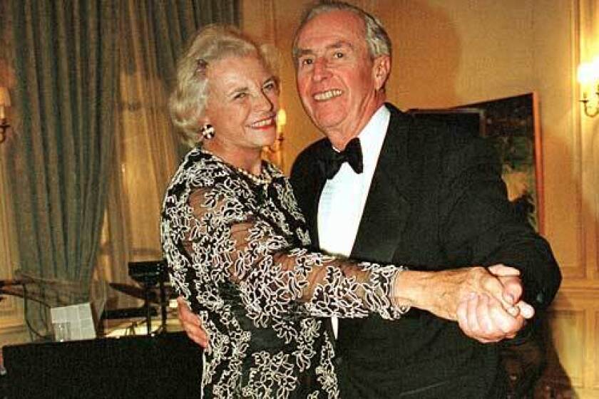 Sandra Day O'Connor dances with her husband, John, in 1998 at the annual Meridien Ball in Washington, D.C.