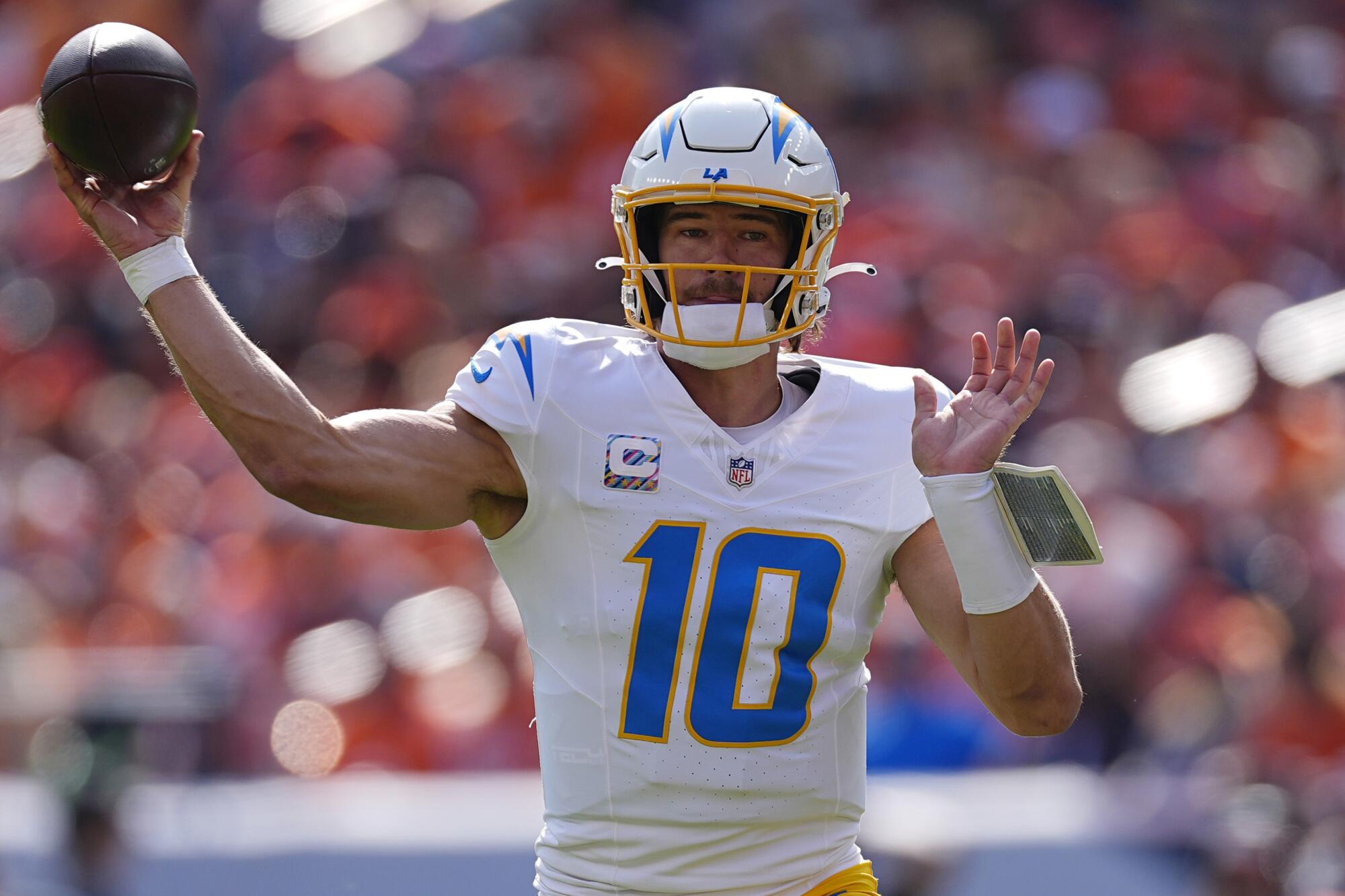 Chargers quarterback Justin Herbert passes against the Denver Broncos on Oct. 13.