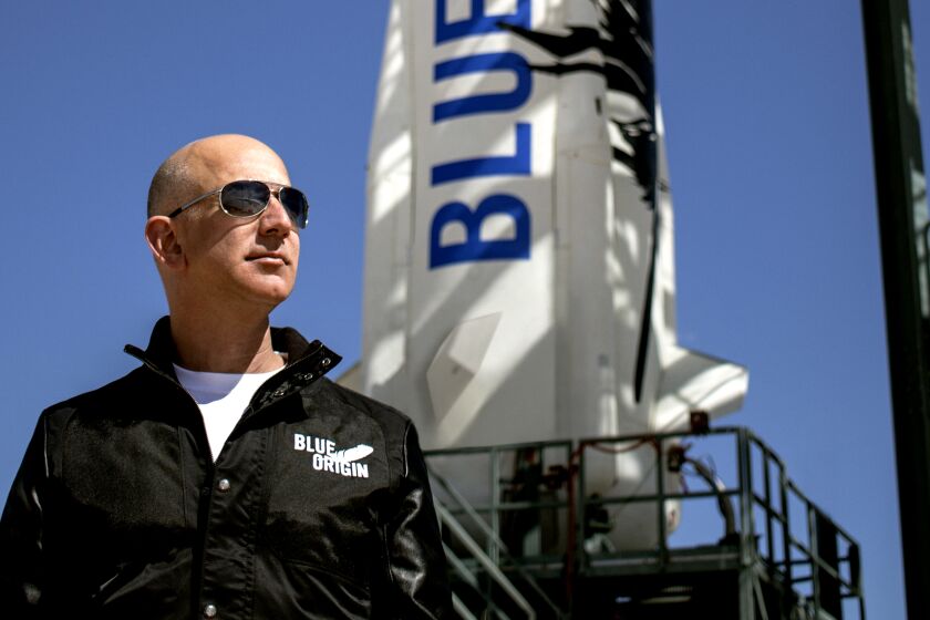 Jeff Bezos, founder of Blue Origin, inspects New Shepard's West Texas launch facility before the rocket's maiden voyage.
