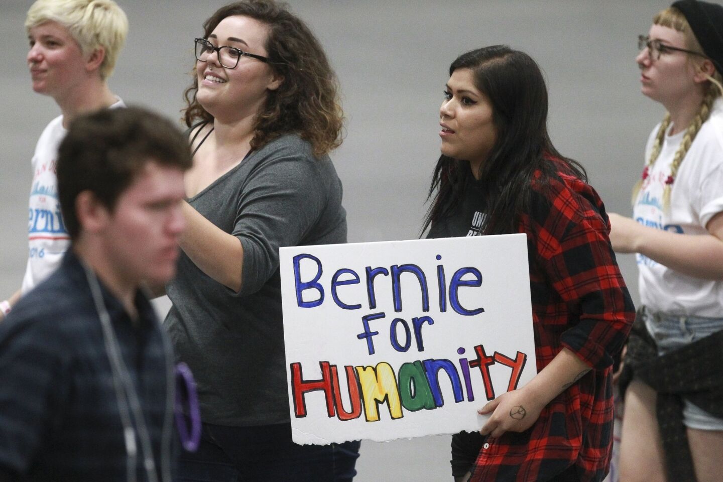 People enter the San Diego Convention Center for Democratic presidential candidate Bernie Sanders.