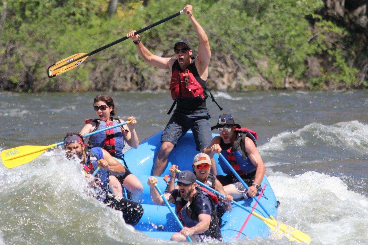 A group of people rafting on Kings River.