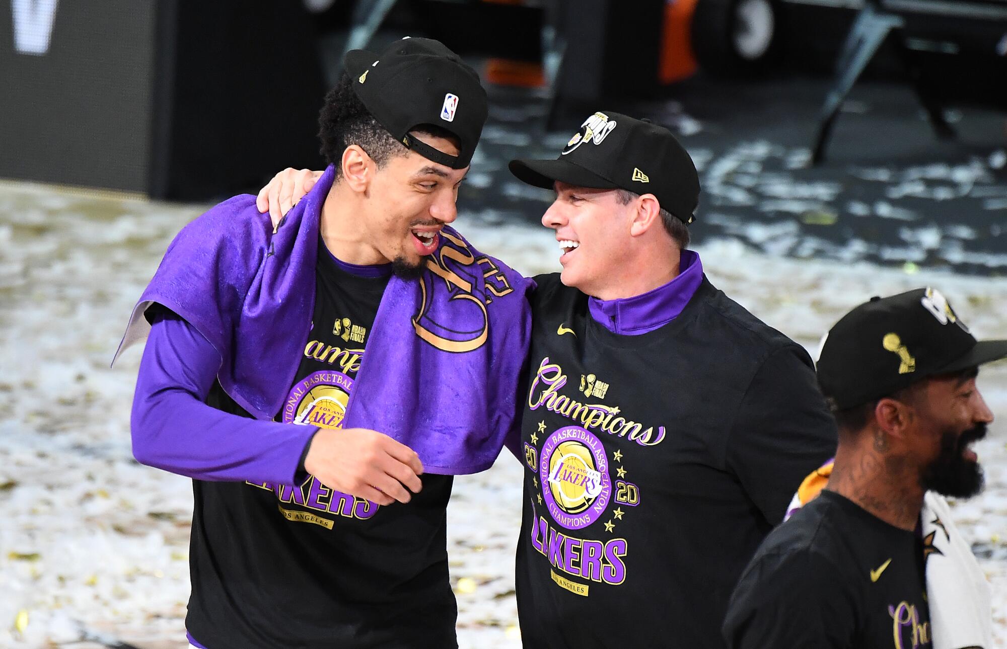 Lakers guard Danny Green and coach Frank Vogel celebrate during the NBA championship trophy presentation on Oct. 11, 2020..