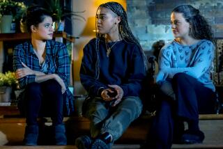Melonie Diaz, left, Lucy Barrett and Sarah Jeffery in "Charmed" on The CW.