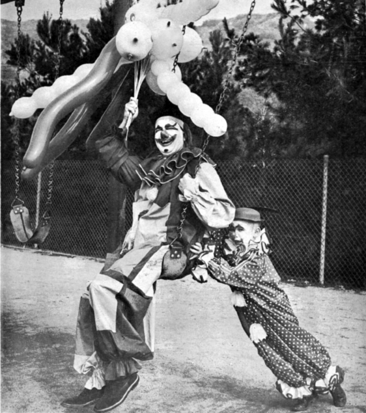 Leon Forsyth and his son Randy, a second-grade student at Paradise Canyon Elementary, dressed as clowns to help publicize in a Valley Sun cover photo the school PTA's Mardis Gras Carnival, held Feb. 27, 1960.