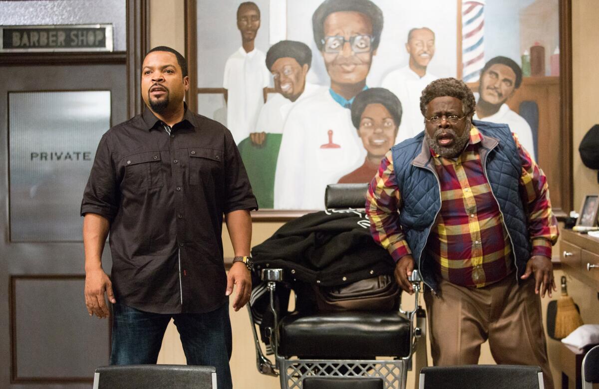 Ice Cube, left, and Cedric The Entertainer appear in "Barbershop: The Next Cut."