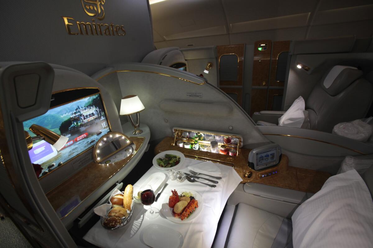 Pay enough on our Air Gini, and your flight experience might match this first-class layout on Emirates Airlines, with a personal mini-bar and reclining seat which turns into a bed.