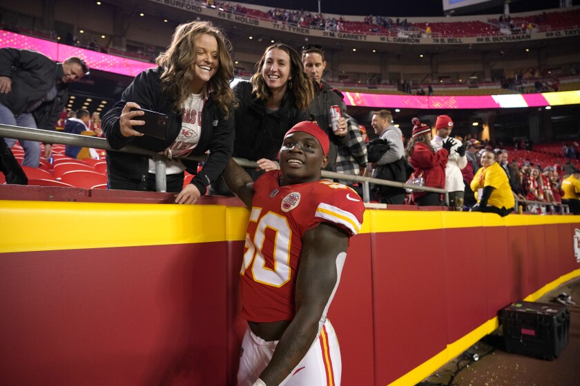 Kansas City Chiefs linebacker Willie Gay celebrates with fans following a 19-9 victory over the Dallas Cowboys in an NFL football game Sunday, Nov. 21, 2021, in Kansas City, Mo. (AP Photo/Ed Zurga)