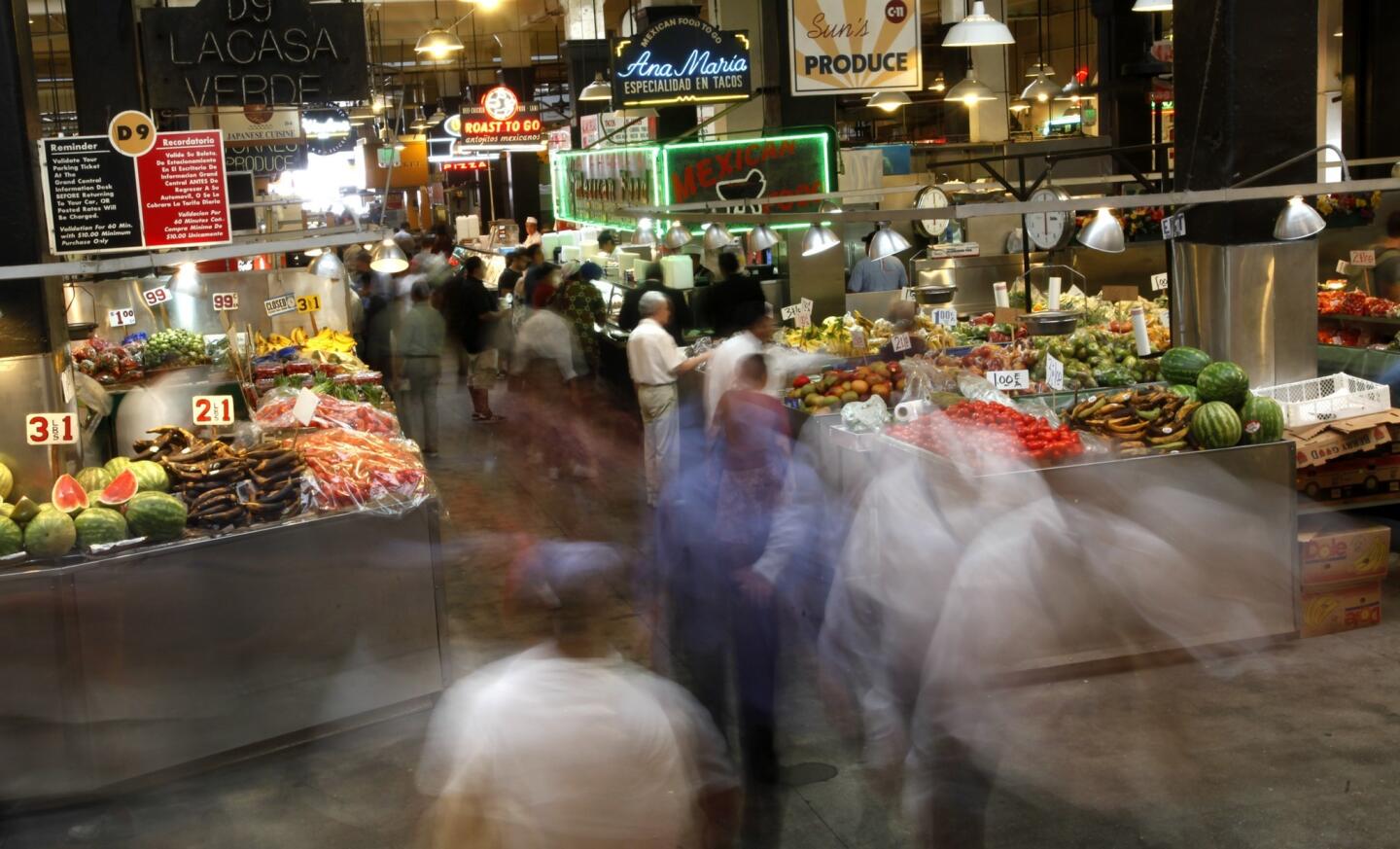 Activity and foot traffic peaks during lunchtime at Grand Central Market in downtown Los Angeles, where the food and a mix of new vendors with more upscale offerings are bound to make it even more crowded.
