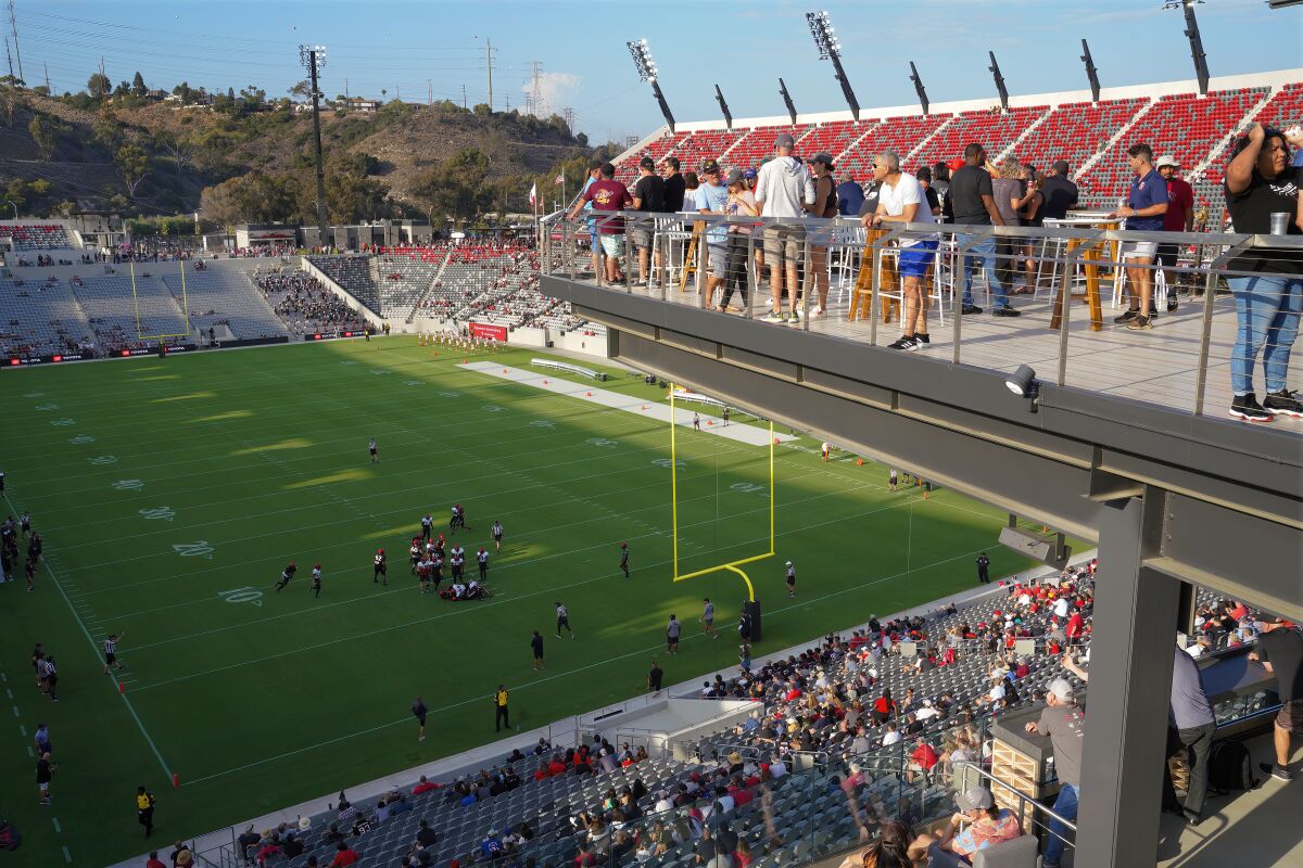 San Diego State football fans watch Saturday's scrimmage from The Sycuan Piers, one of the new stadium's signature spots.