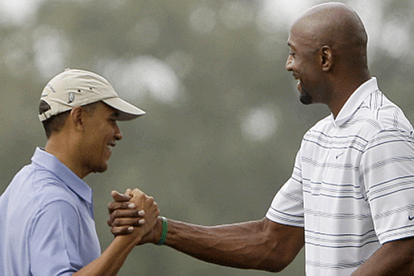 Former Miami Heat great Alonzo Mourning, right, joined President Obama for a round of golf Saturday morning in Fort Lauderdale.