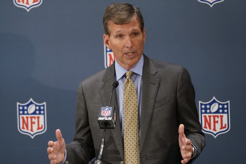 Allen Sills, chief medical officer for the NFL, speaks at a news conference.