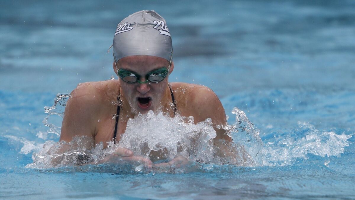 Newport Harbor High's Ayla Spitz competes in the girls' 400-yard individual medley relay championship final at the Capistrano Valley Relays on March 10.