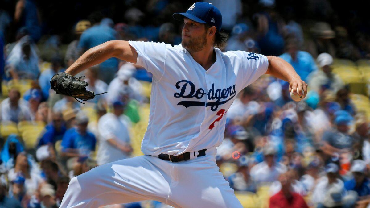 The Dodgers' Clayton Kershaw serves up a pitch during the second inning against the Kansas City Royals on Sunday.