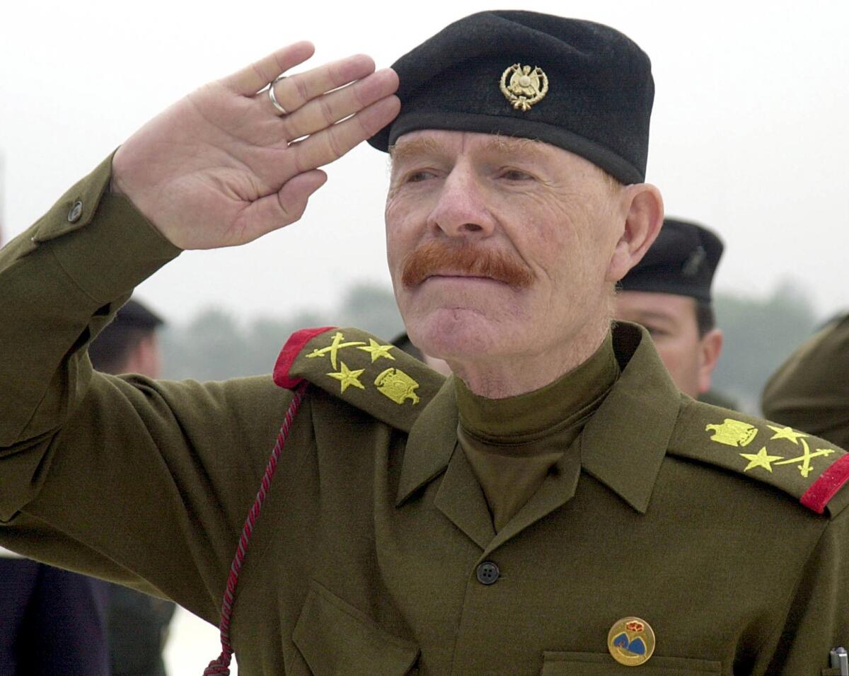 Izzat Ibrahim, shown on Dec. 1, 2002, while serving as vice chairman of Saddam Hussein's Revolutionary Command Council.