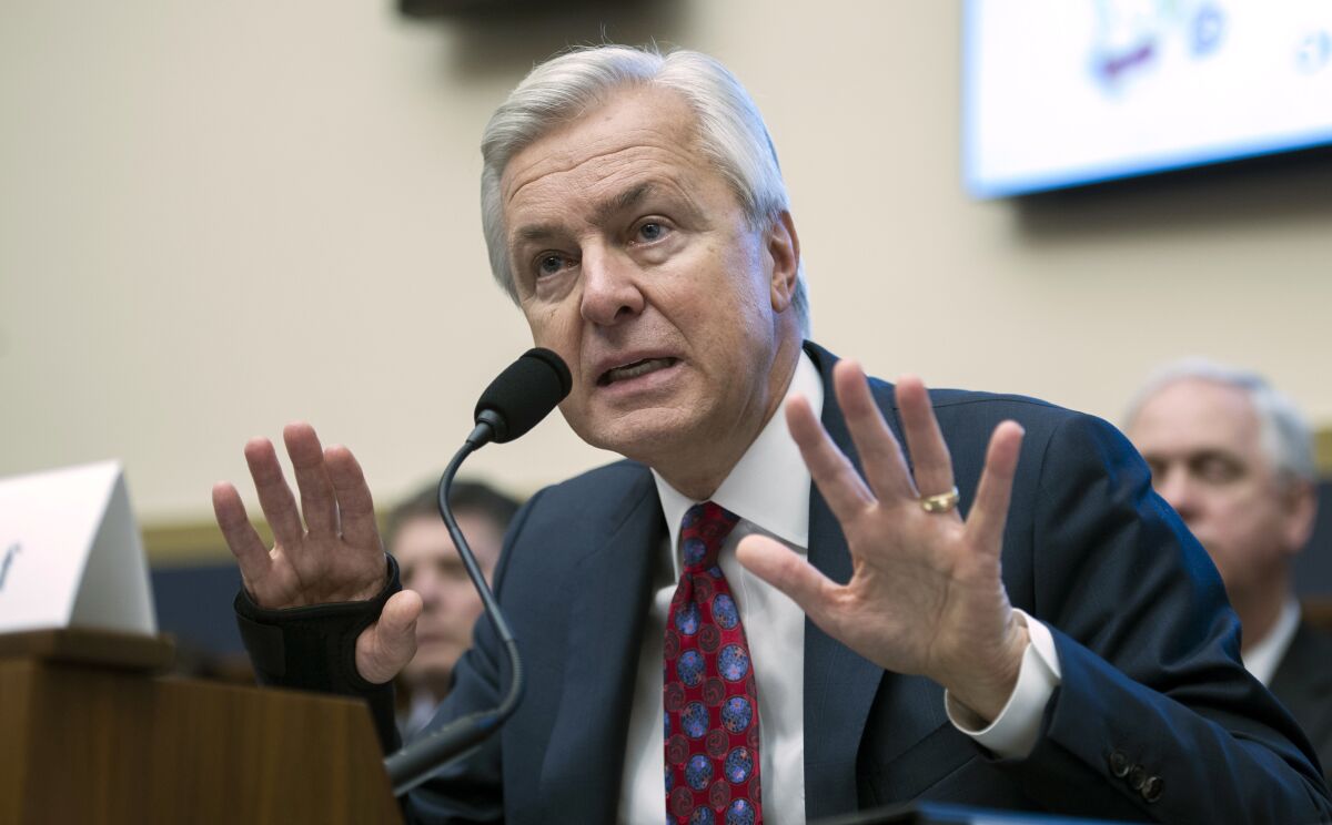 Former Wells Fargo Chief Executive John Stumpf testifies on Capitol Hill on Sept. 29, 2016, about the bank's opening of unauthorized customer accounts. The bank is still trying to regain its reputation.