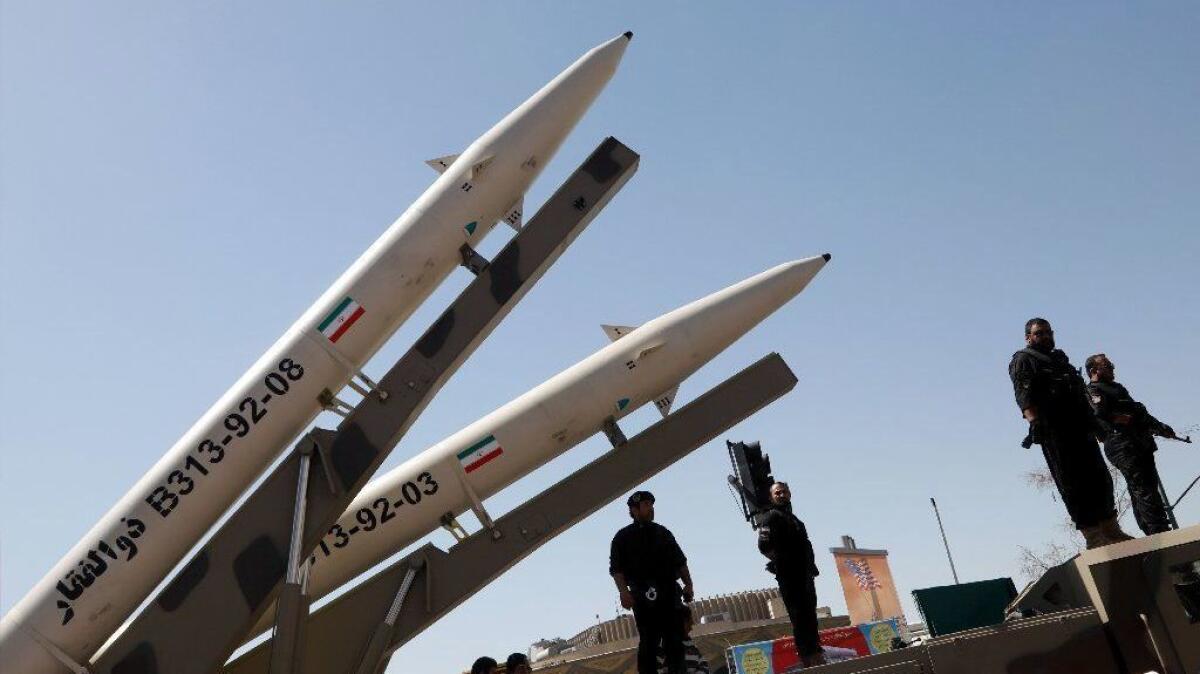 Ballistic missiles are displayed during a rally marking Quds Day in Tehran.