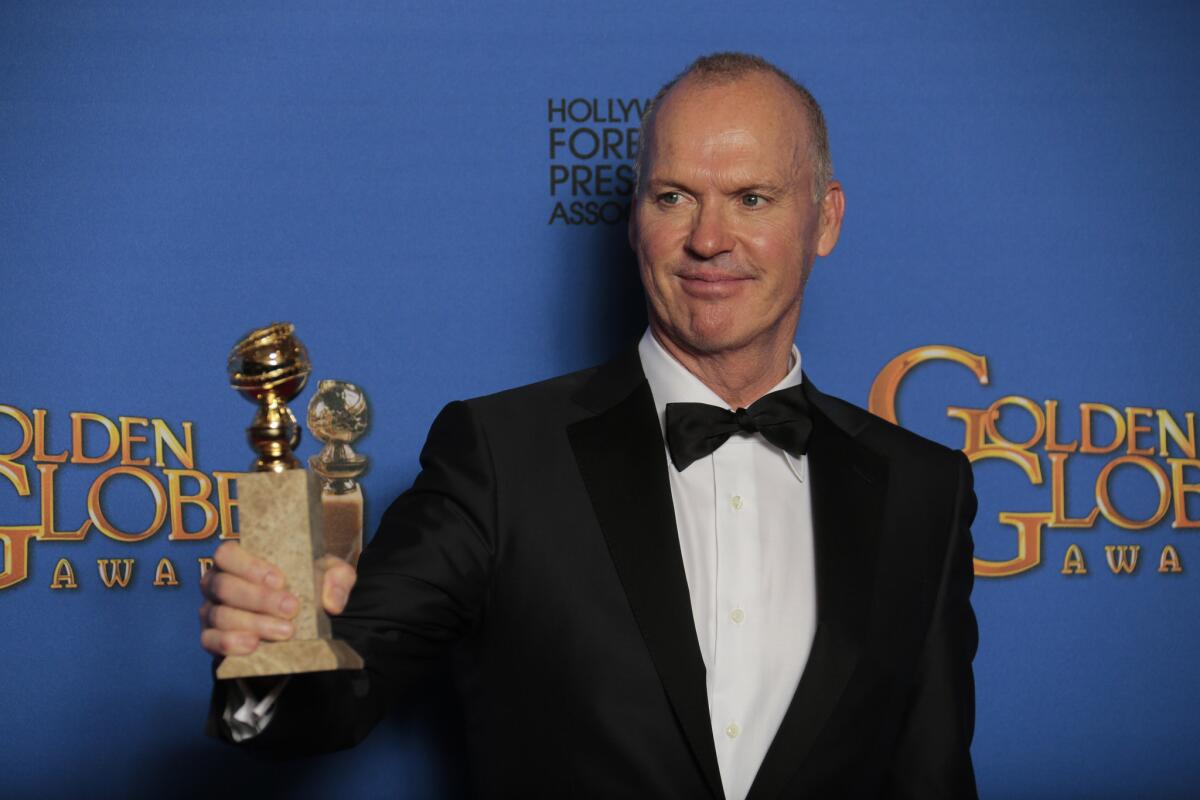 Michael Keaton with his Golden Globe Award for Performance By An Actor In A Motion Picture-Comedy Or Musical at the 72nd Golden Globe Awards.