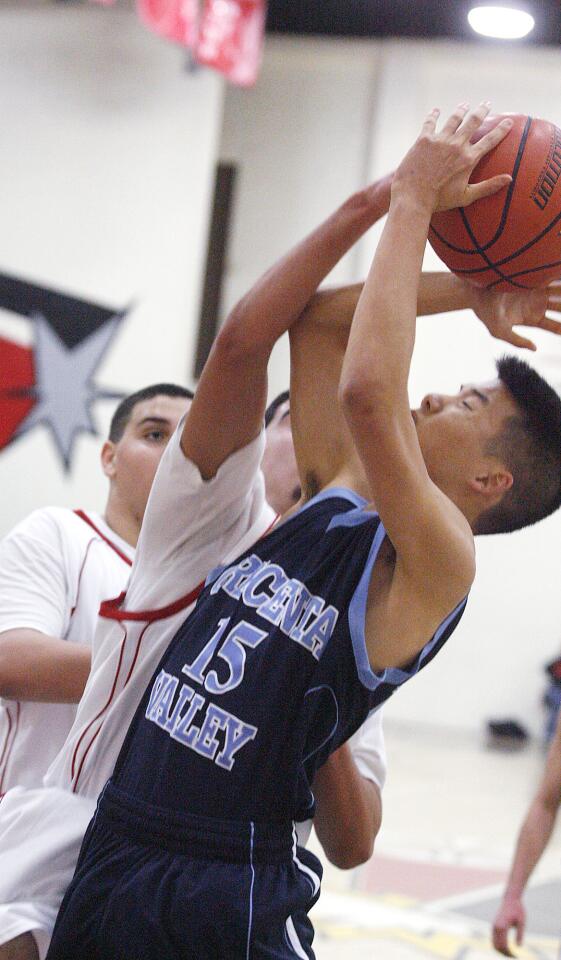 Photo Gallery: Crescenta Valley v. Glendale Pacific League boys basketball