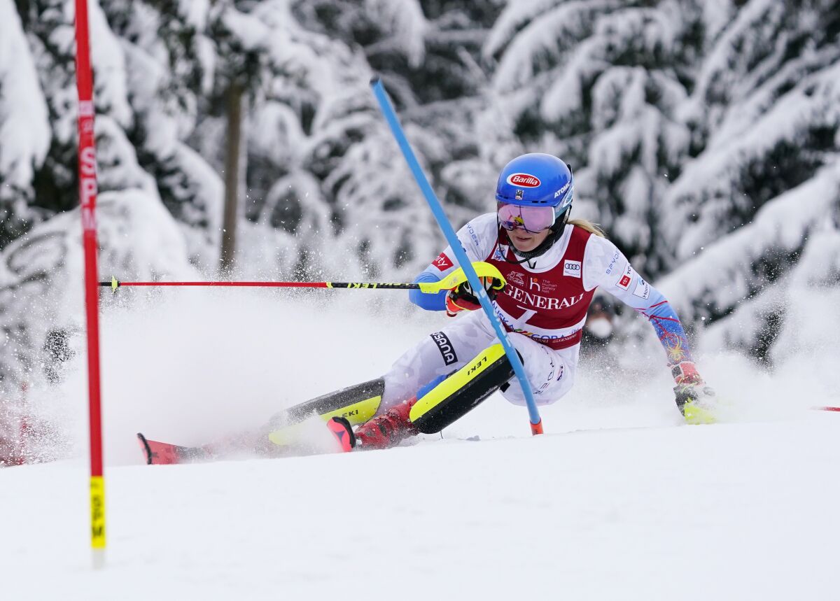 FILE - United States' Mikaela Shiffrin competes during the first run of an alpine ski, World Cup women's slalom in Kranjska Gora, Slovenia, Sunday, Jan. 9, 2022. Shiffrin is hoping to enter all five individual Alpine skiing races at the Beijing Olympics and add to her career total of three Winter Games medals. The 26-year-old American could be the star of the show but she will be challenged by Slovakia's Petra Vlhova and Italy's Sofia Goggia. (AP Photo/Pier Marco Tacca, File)
