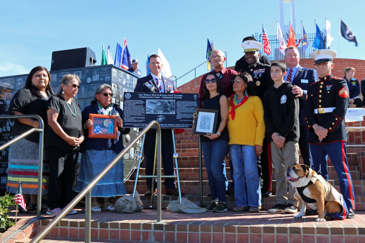 The Mount Soledad Memorial Association's Phil Kendro (center) and others commemorate the Navajo Code Talkers.