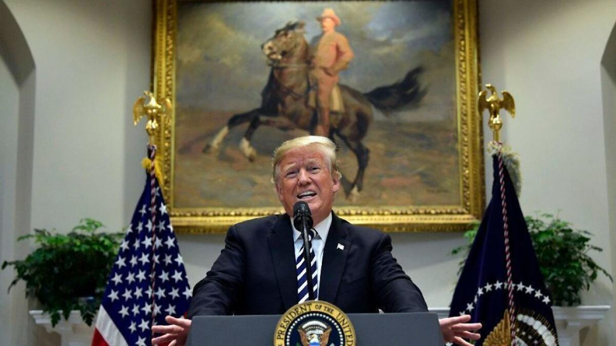 President Trump talks about immigration and gives an update on border security from the Roosevelt Room of the White House on Thursday.