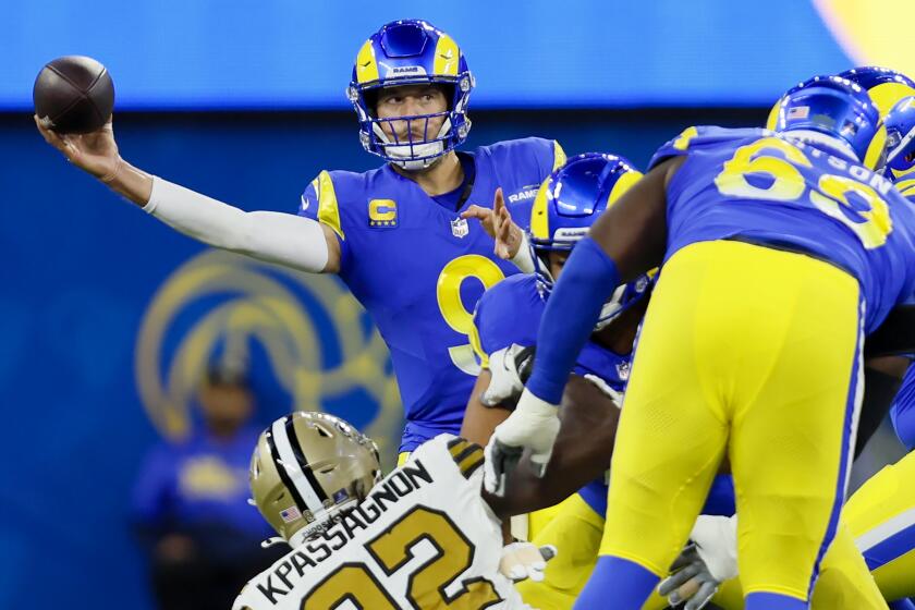 Los Angles Rams quarterback Matthew Stafford throws a pass.