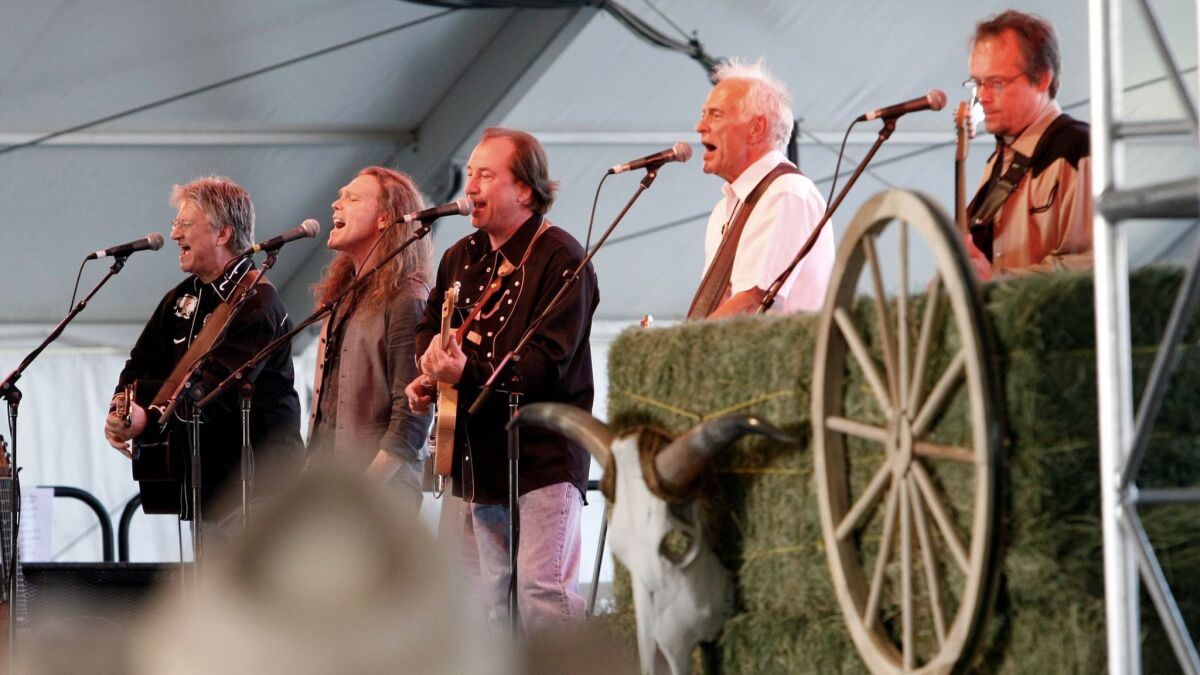 Poco performs at the 2009 Stagecoach Country Music Festival in Indio with some current and previous members. From left: Richie Furay, Timothy B. Schmit, Jim Messina, Paul Cotton and Jack Sundrud.