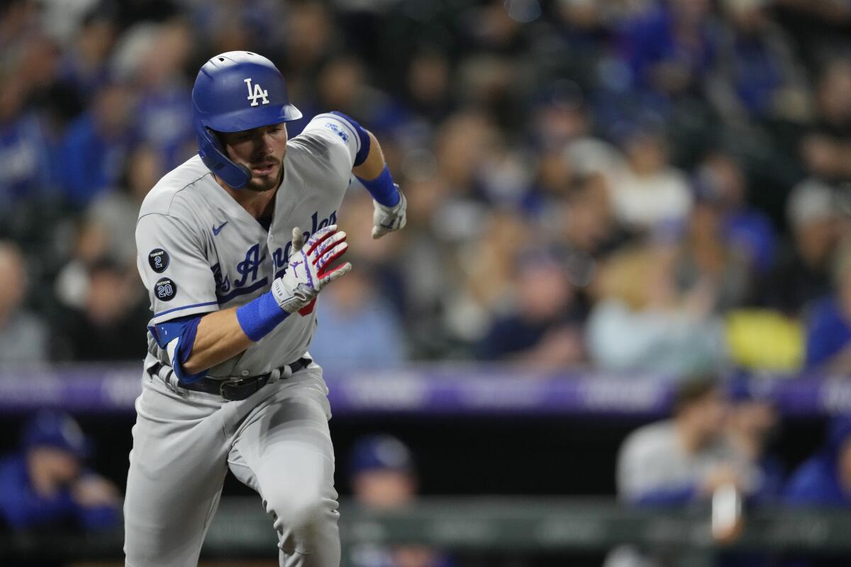 Dodgers second baseman Gavin Lux runs to first during a game against the Colorado Rockies on Sept. 22.