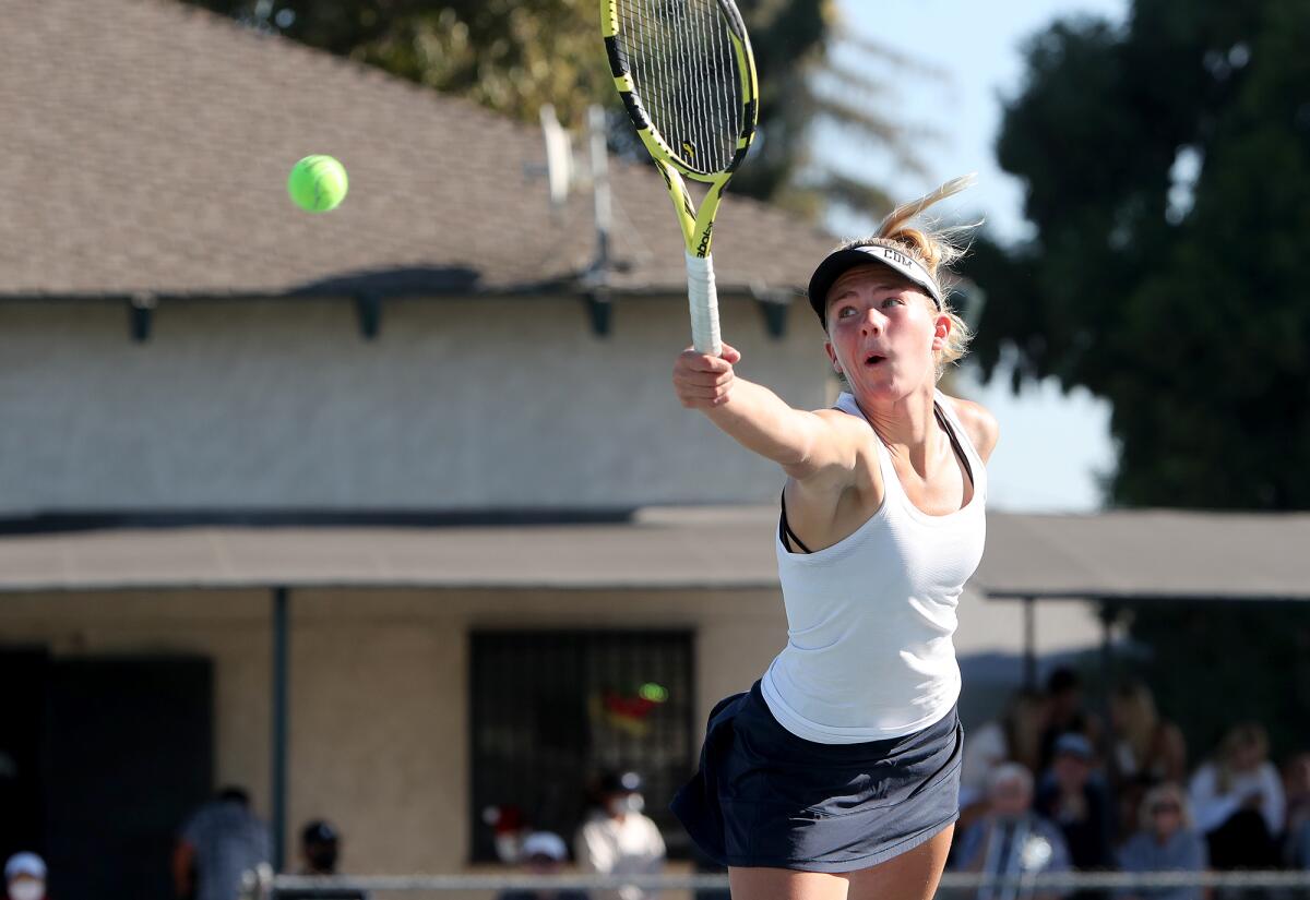Corona del Mar doubles player Jane Paulsen lunges for a shot in the CIF Southern Section Individuals tournament on Wednesday.