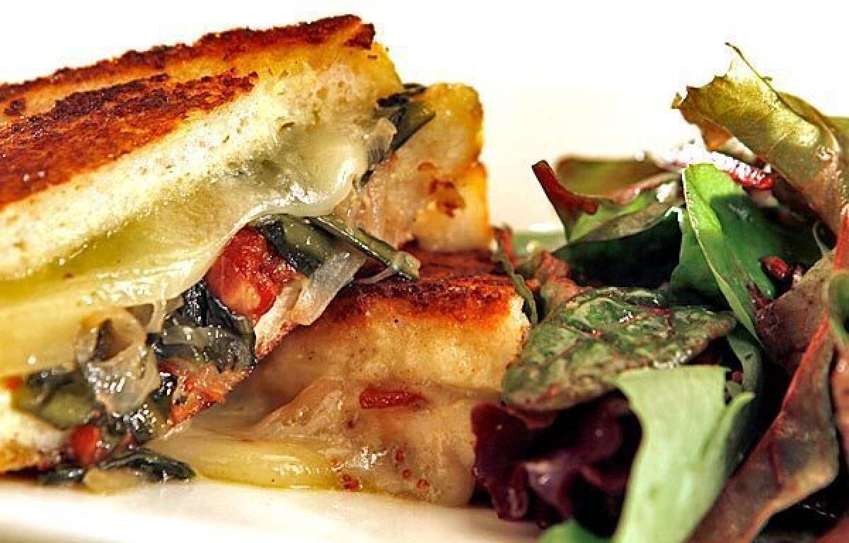 Savory French toast is stuffed with cheese, bacon and greens.