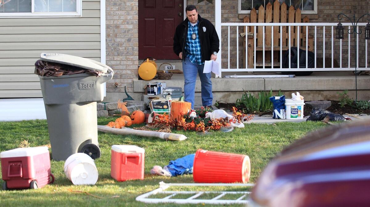 Police in Pleasant Grove, Utah, at a home where the bodies of seven infants were discovered.