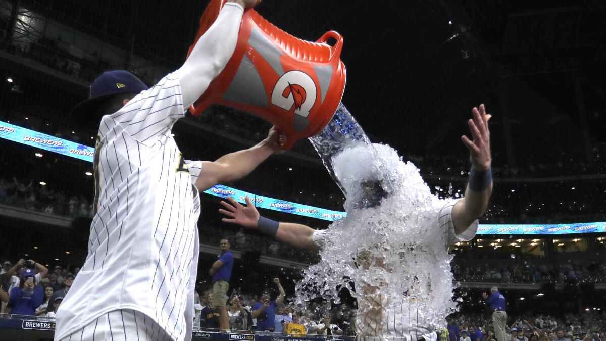 Adames, Santana each hit in two runs to lead Brewers over Rangers 6-1