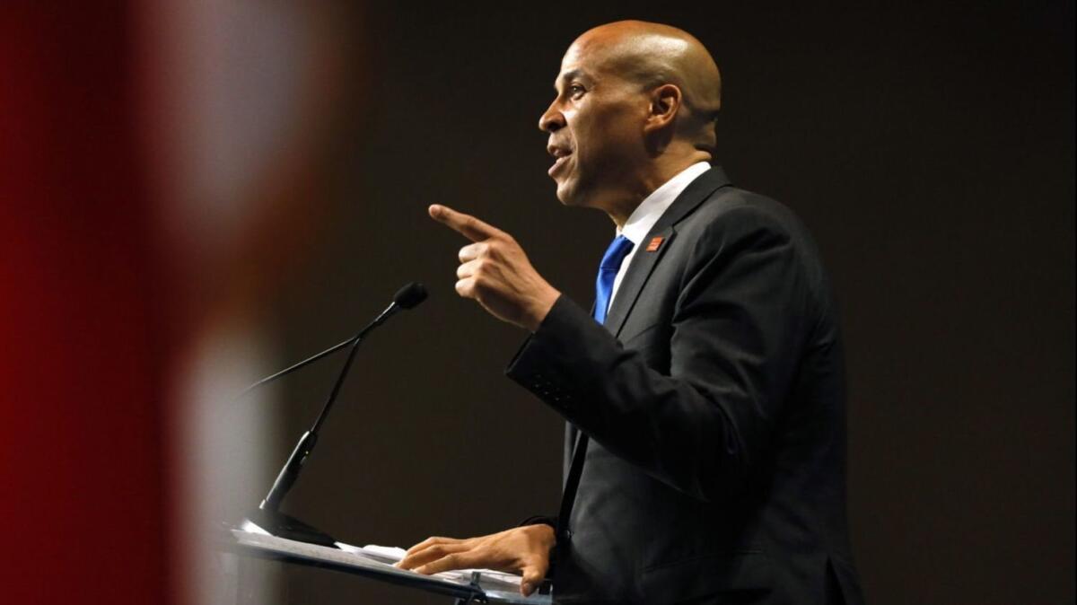 Sen. Cory Booker of New Jersey talked of his family's roots in an Iowa mining town.