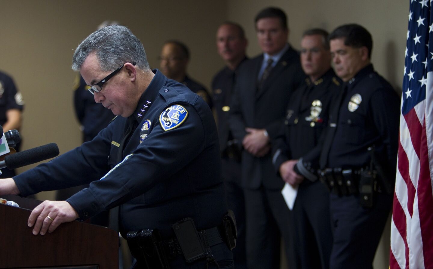 Riverside Police Chief Sergio Diaz looks down as he announces that the 34-year-old officer killed in the early morning shooting was an 11-year veteran of the department during a press conference at the Magnolia Facility of the Riverside Police Department. Two officers were shot at the corner of Magnolia and Arlington avenues. The officers were sitting at a red light when they were ambushed. One was killed, the other was still in surgery Thursday morning. The alleged shooter is fired LAPD officer Christopher Jordan Dorner,33.