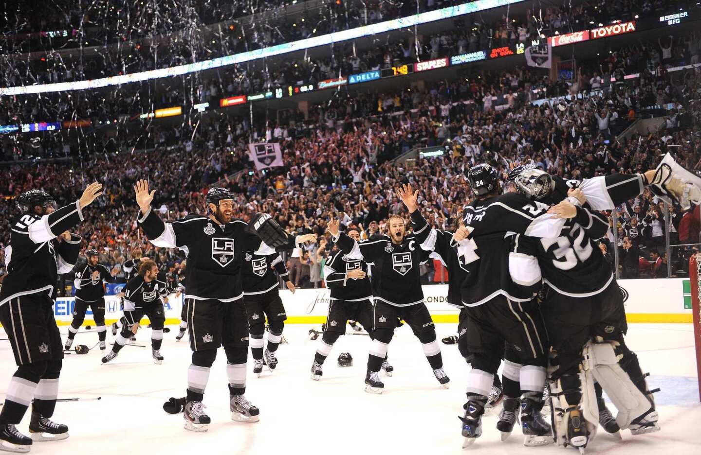 Los Angeles Kings players celebrate the Stanley Cup after defeating the New Jersey Devils in Game 6 of the best-of-seven Final series at Staples Center in June.