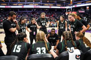 Coach Kerwin Walters of Sage Hill tries to rally his team in the Division I state final.