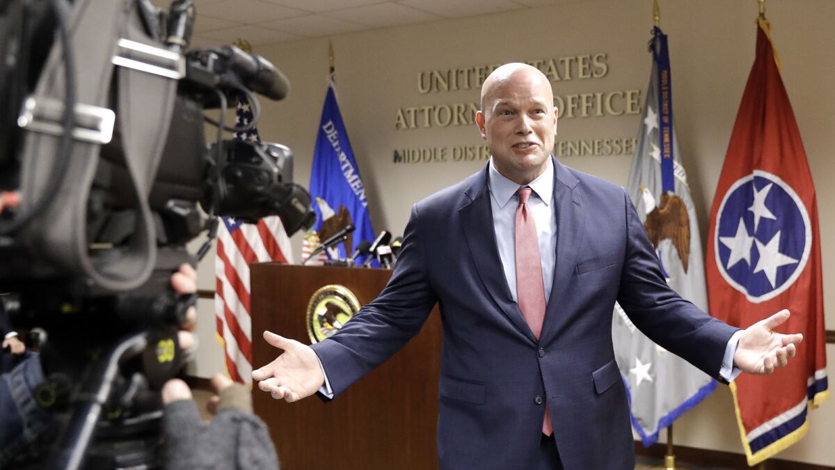 Acting Atty. Gen. Matthew Whitaker jokingly asks for questions as he leaves a news conference where no questions were allowed Thursday in Nashville, Tenn.