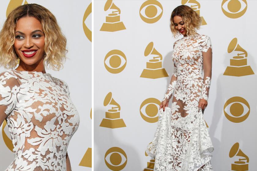 Beyonce's sheer white floral lace gown was exactly the kind of risque style statement we expect to see on music's biggest night. The dress was created by Los Angeles-based designer and "Project Runway" alum Michael Costello.