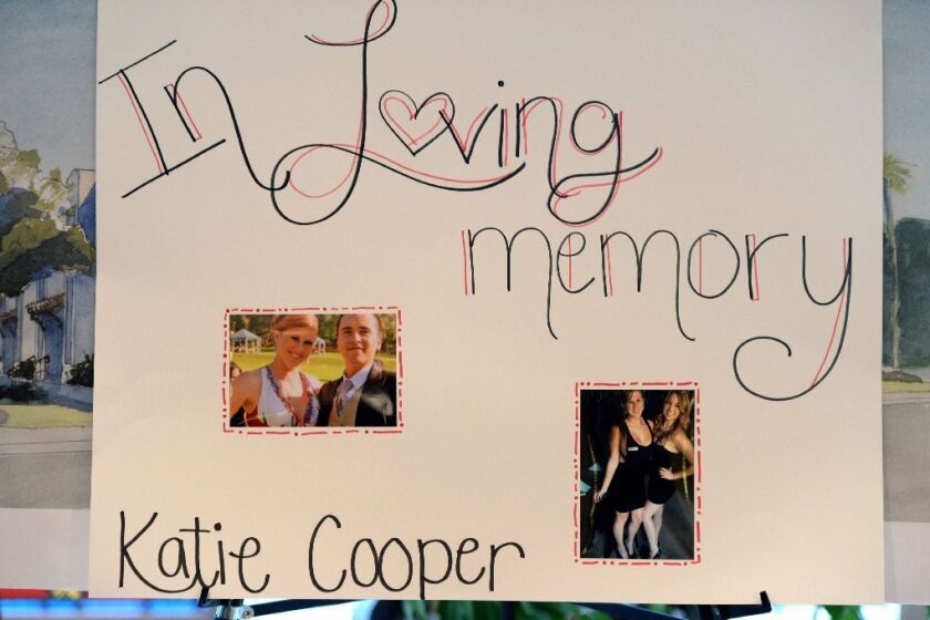 Photographs of Katherine Cooper are displayed at a memorial service at St. Mark's University Parish in Isla Vista.