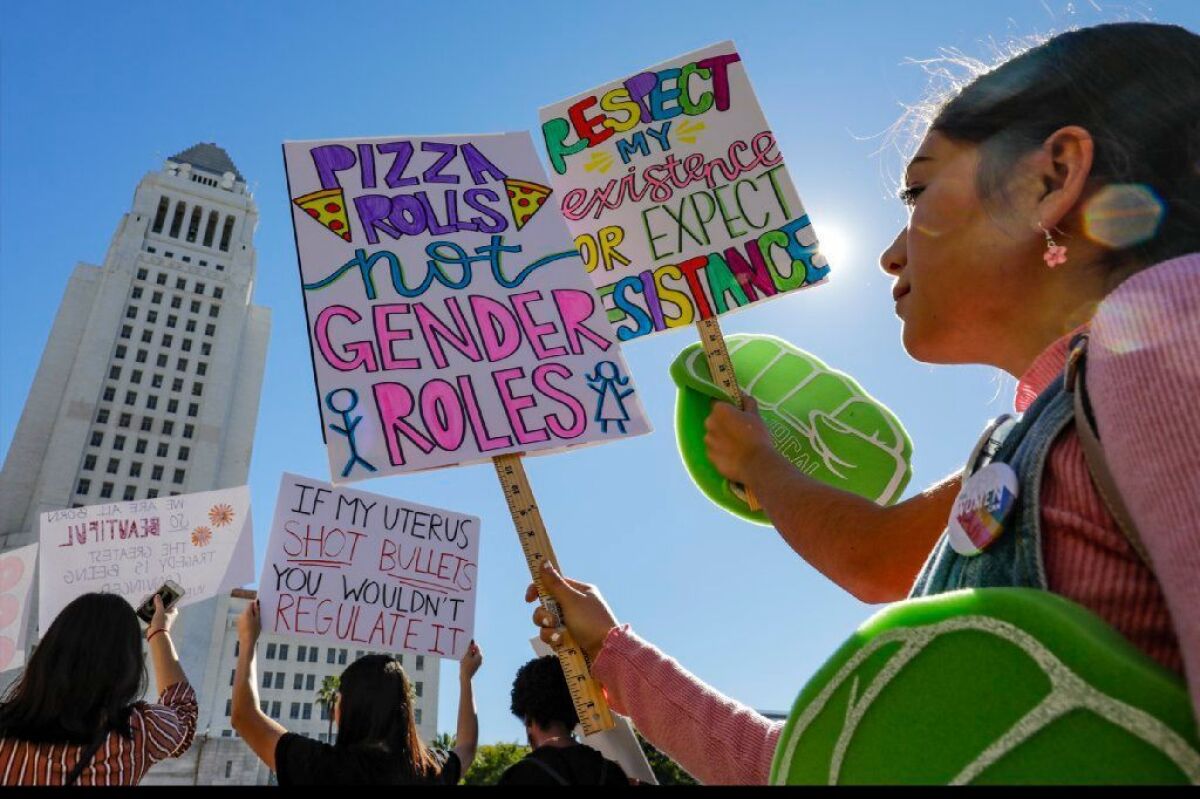 Stefahnie Sandoval, 15, of Los Angeles takes part in the third Women's March in downtown L.A.
