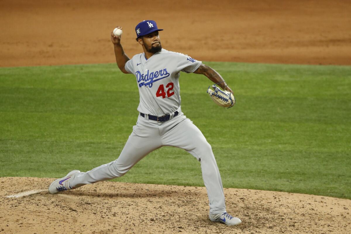 Dodgers pitcher Dennis Santana throws against the Texas Rangers in August. 