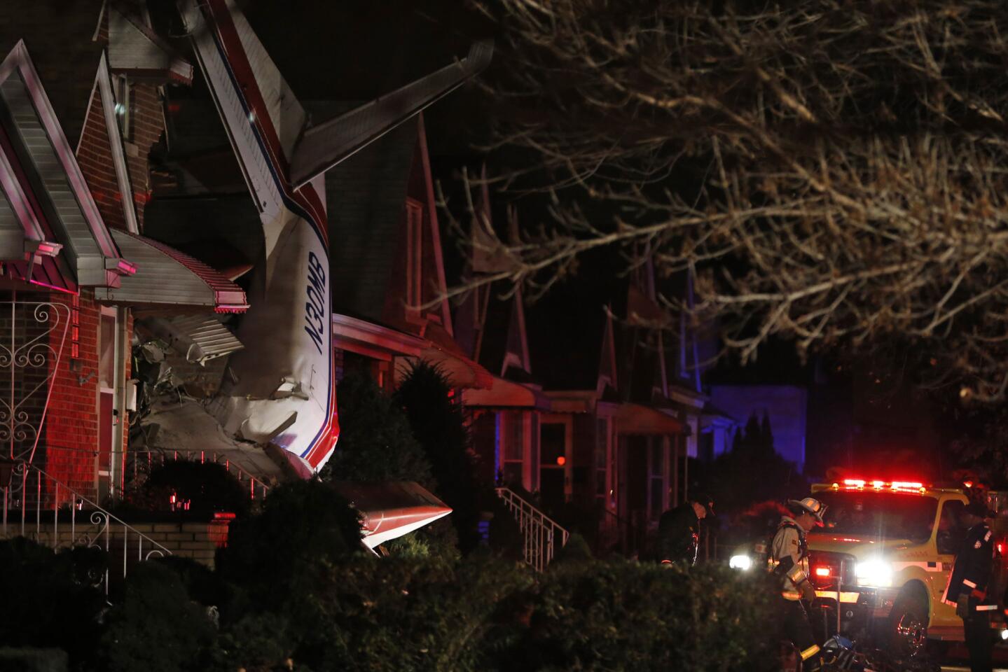 Plane crashes into house