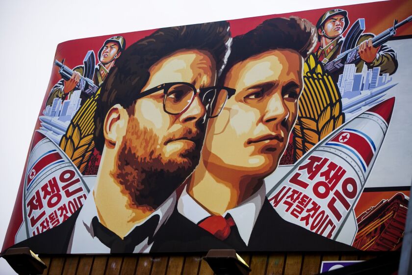 A banner for "The Interview" is posted outside Arclight Cinemas in Hollywood on Dec. 17.
