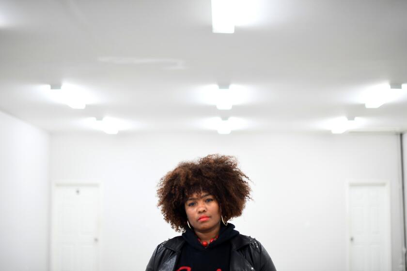 LOS ANGELS, CALIFORNIA JANUARY 8 ,2019-Kika Keith sits an empty store front where she wants to open up shop that sells cannabis beverages. Los Angeles has been slow to start approving marijuana businesses like hers, leaving Keith in limbo ash she pays rent on an empty storefront. (Wally Skalij/Los Angeles Times)