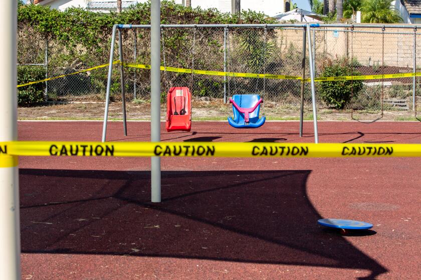 VISTA, CA - OCTOBER 21: Playground equipment is wrapped in caution tape at T.H.E. Learning Academy in Vista on Wednesday, Oct. 21, 2020 in Vista, CA. (Jarrod Valliere / The San Diego Union-Tribune)