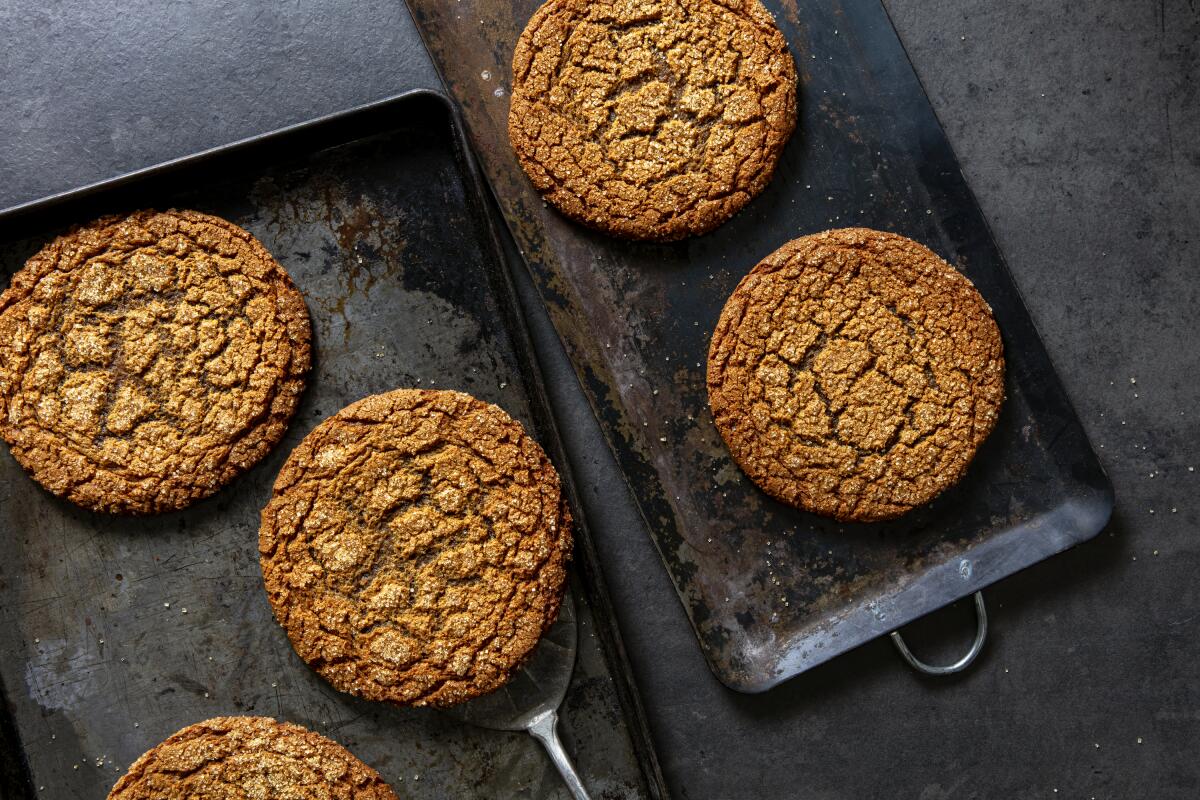 Large Ginger Molasses Cookies on metal baking trays