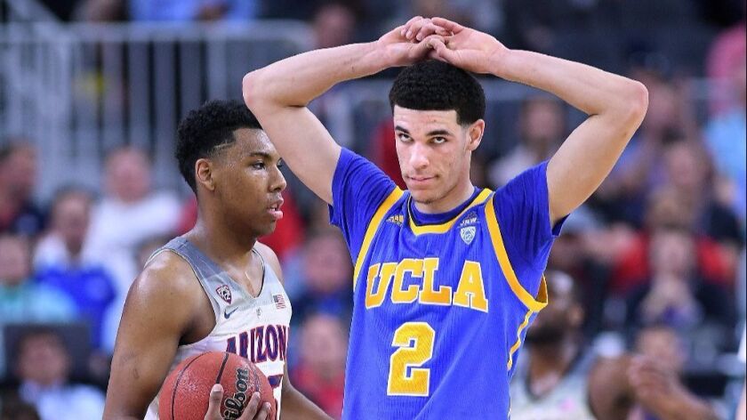 UCLA's Lonzo Ball looks away after fouling Arizona's Allonzo Trier during a Pac-12 Tournament semifinal on March 10.