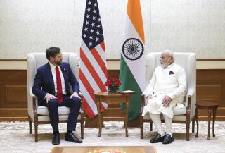 U.S. Vice President JD Vance talks\ing with Indian Prime Minister Narendra Modi