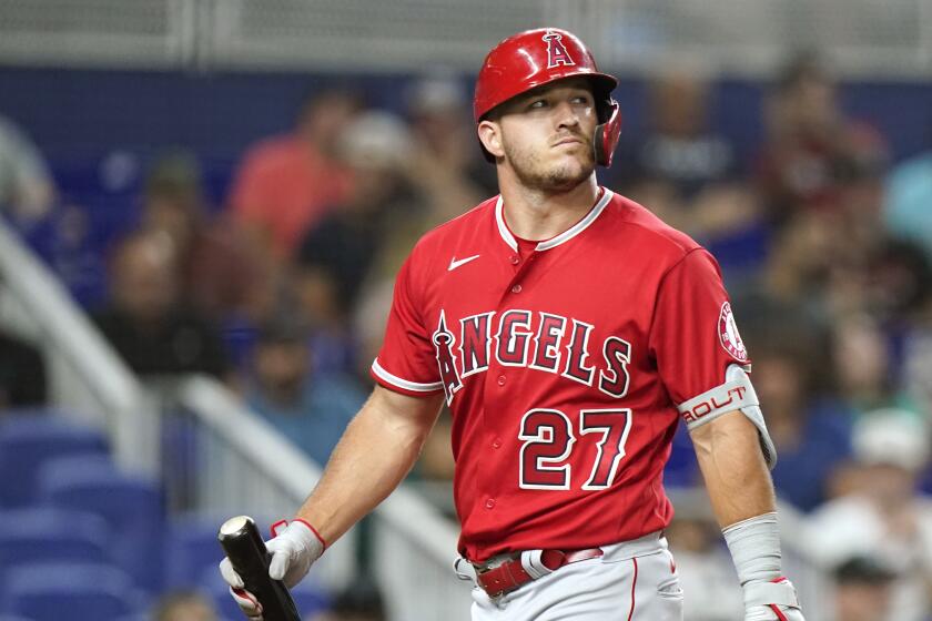 Los Angeles Angels' Mike Trout (27) bats during a baseball game against the Miami Marlins, Tuesday, July 5, 2022, in Miami. (AP Photo/Lynne Sladky)