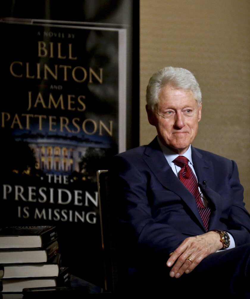 In this Monday, May 21, 2018, photo, former President Bill Clinton listens during an interview about a novel he wrote with James Patterson, "The President is Missing," in New York.